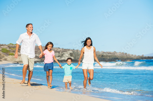Happy Family on the Beach © EpicStockMedia