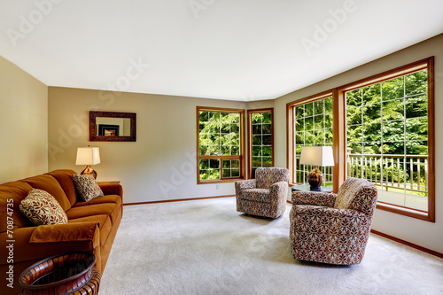 Birght living room with large french window © Iriana Shiyan