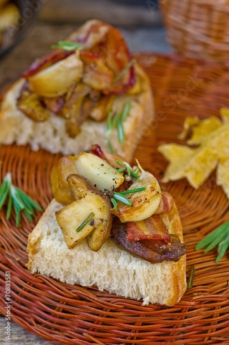Fried cepes with bacon, garlic and rosemary