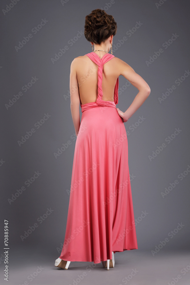 Fototapeta premium Rear View of Shapely Lady in Evening Gown