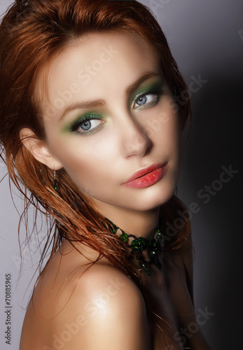 Glam. Refined Young Auburn Woman. Head and Shoulders Portrait