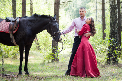 happy couple and horse © alkiona_25