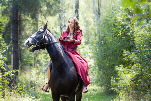 brunette girl on horse