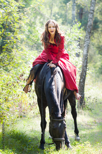 brunette girl on horse © alkiona_25