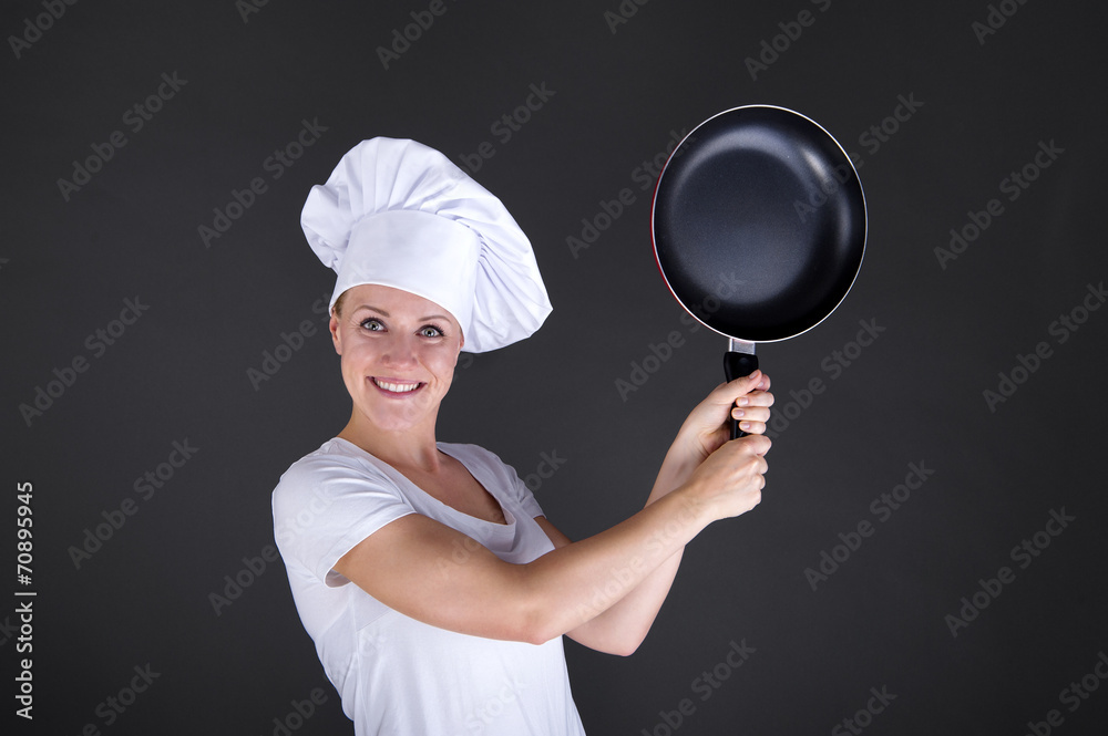 cooking and food concept - smiling female chef, cook or baker wi cooking and food concept - smiling female chef, cook or baker wi