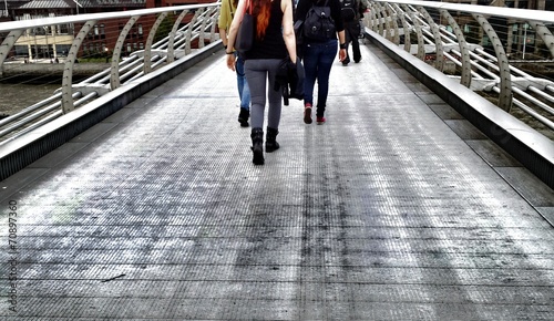 Walking on the bridge photo