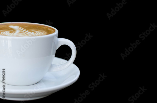 white cup of coffee isolated on black background