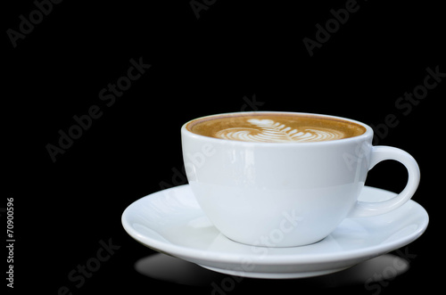 White cup of coffee isolated on black background