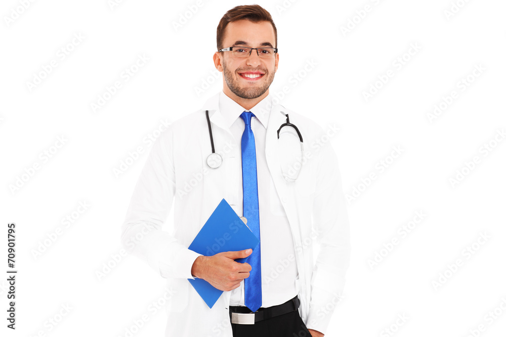 Handsome young doctor holding a folder Handsome young doctor holding a folder