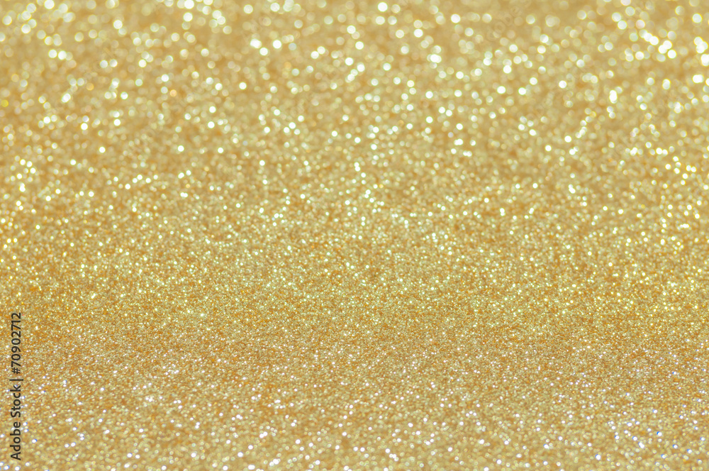 defocused abstract golden lights background defocused abstract golden lights background