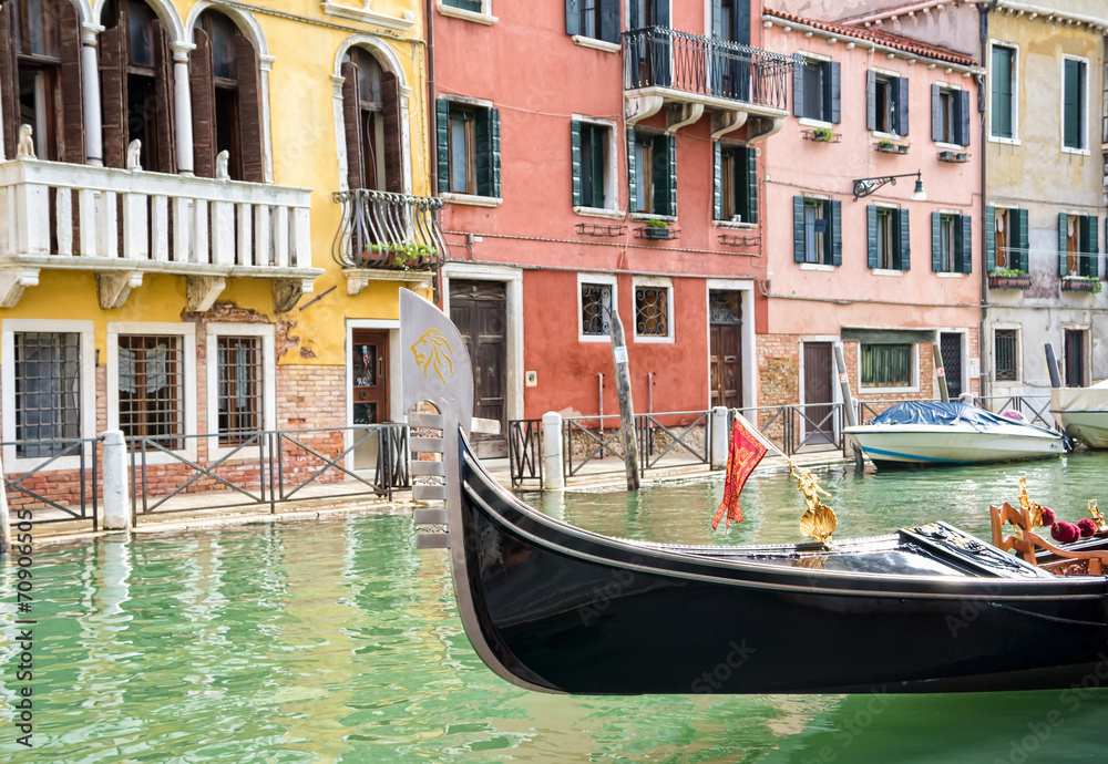Gondola moored on a venetian canal - Venice, Italy Europe