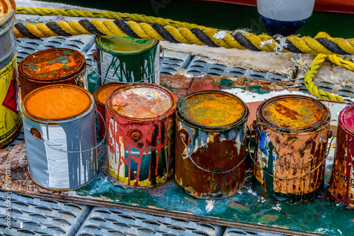 Colorful paint cans on the docks