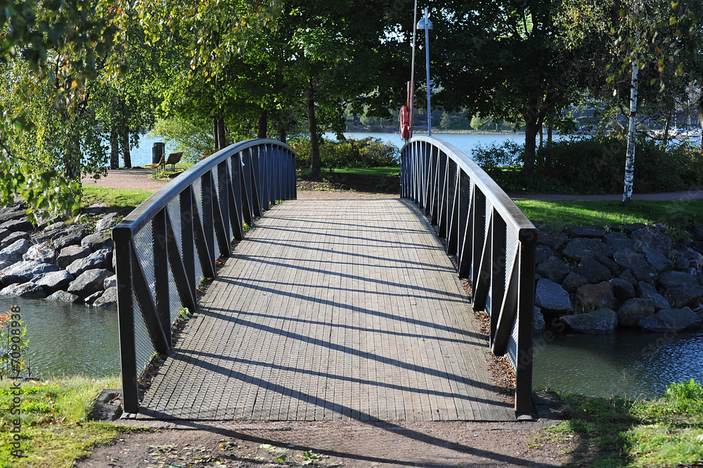 beautiful bridge in the Park of Helsinki in autumn