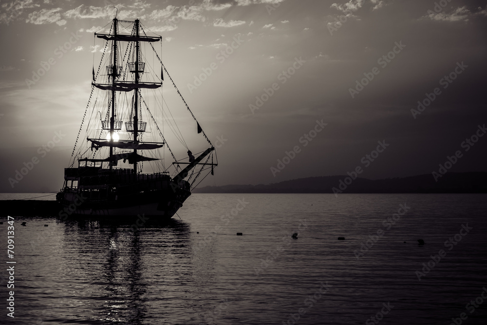 Sailboat in the bay. Stylization. Toning. Sepia. Sailboat in the bay. Stylization. Toning. Sepia.