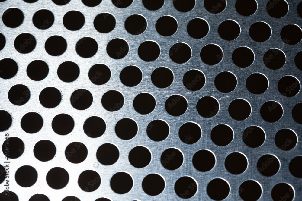 Metal background with holes Metal background with holes