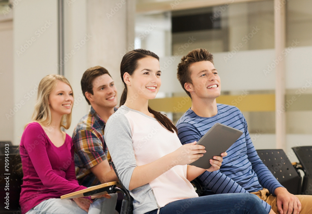 group of smiling students with tablet pc group of smiling students with tablet pc