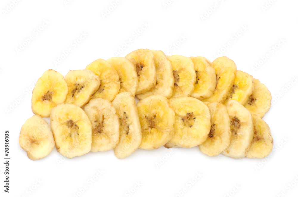 a pile of banana chips on white background
