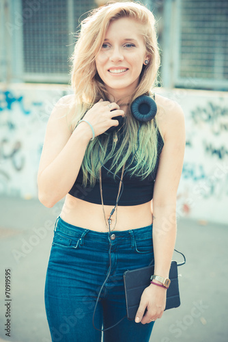 beautiful young blonde hair woman hipster listening music