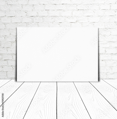 Blank paper poster and brick wall background  template