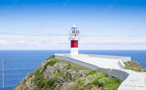 Ortegal lighthouse, Galicia, Spain. Blue sky photo