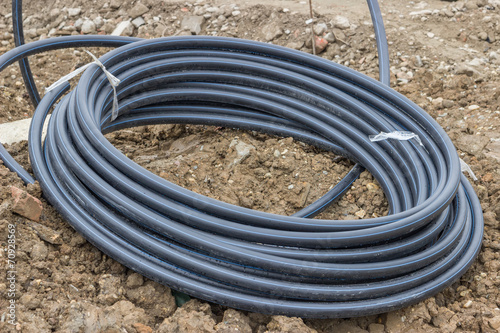 Fototapeta Naklejka Na Ścianę i Meble -  rolled pvc pipe for water supply