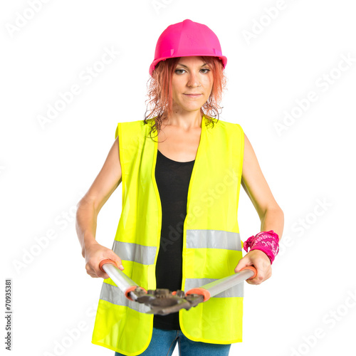 Worker woman with scissors mower over white background