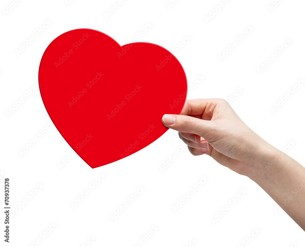 Hand picking red paper heart Hand picking red paper heart
