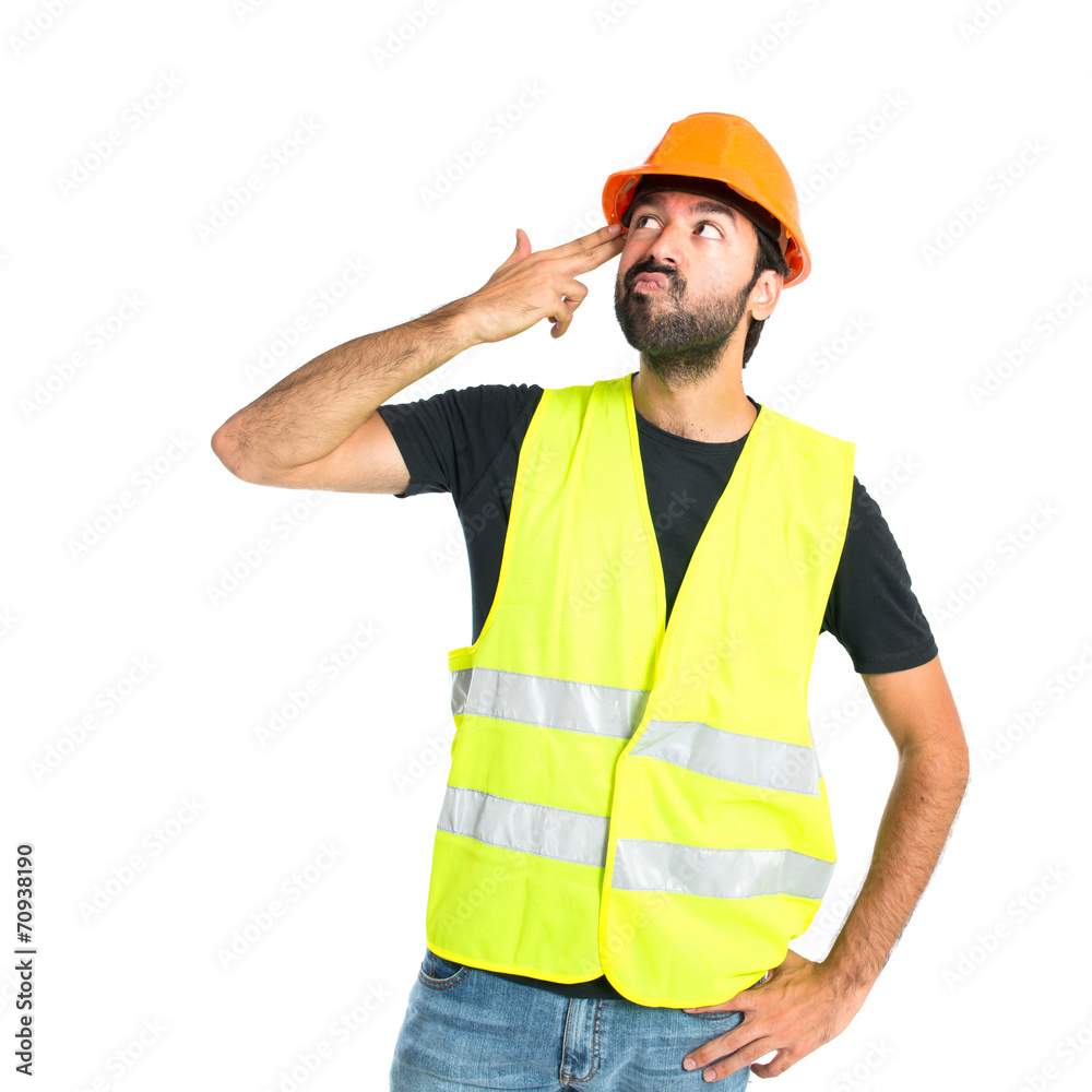 Workman making suicide gesture over white background Workman making suicide gesture over white background