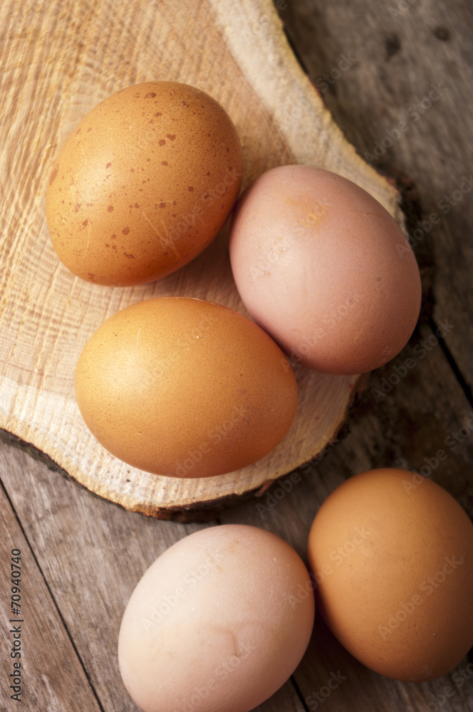 eggs close up on wooden background top view eggs close up on wooden background top view