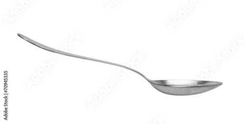old silver spoon isolated on white background