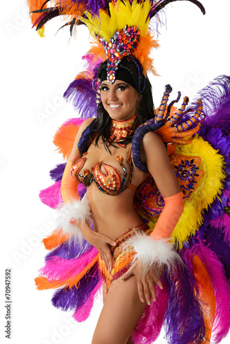 Smiling beautiful girl in a colorful carnival costume
