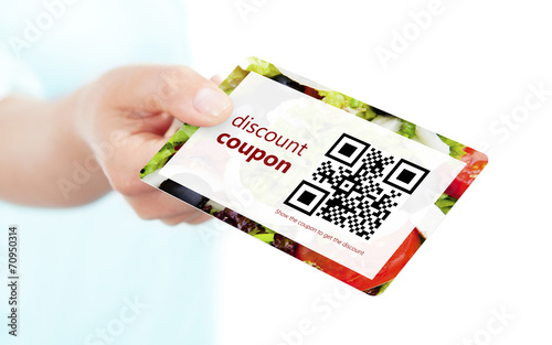 hand holding food discount coupon with qr code isolated over whi