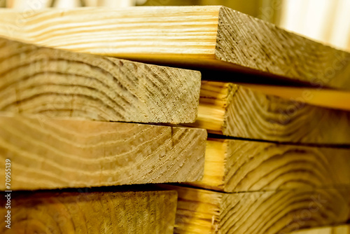 stacked wood boards for building construction