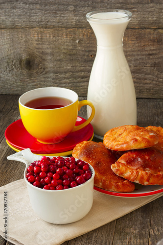 tea and cakes  cranberries and milk