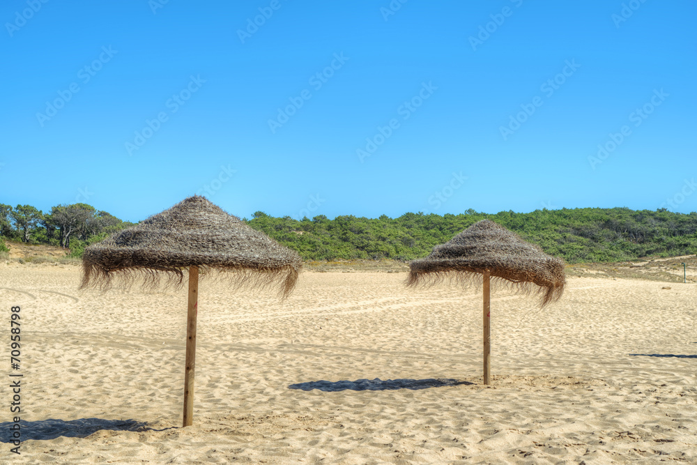 Umbrella at the shore of the Atlantic Ocean Umbrella at the shore of the Atlantic Ocean