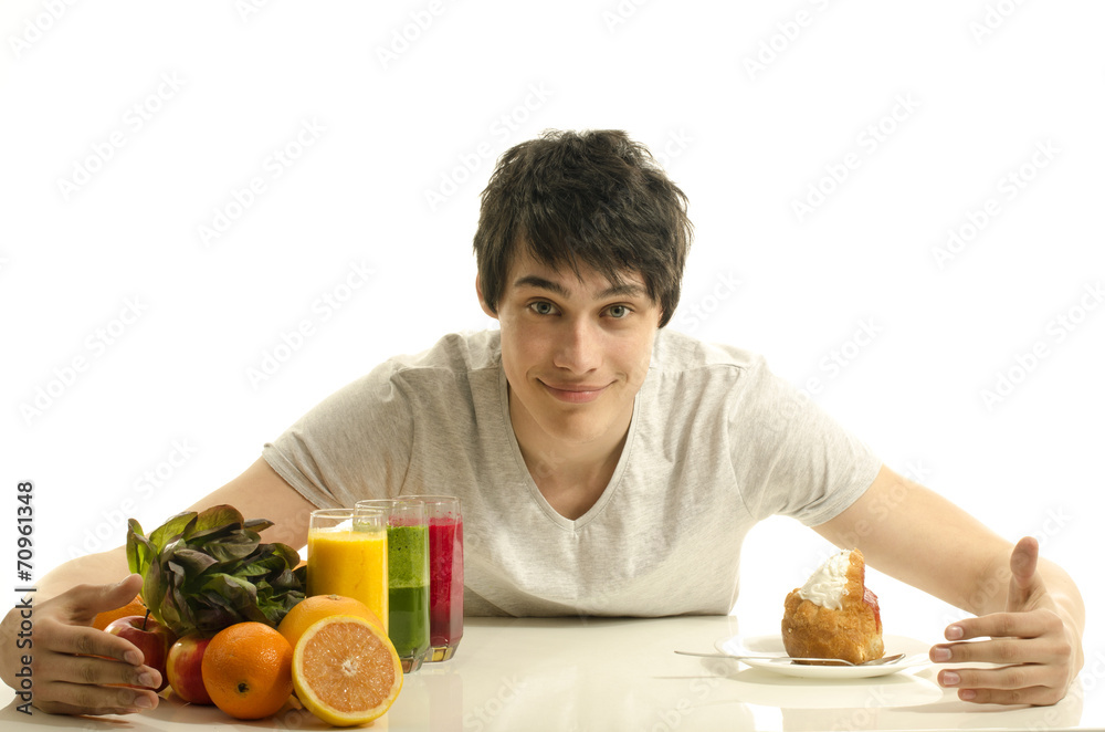 Man choosing between fruits, smoothie, organic salad and sweets