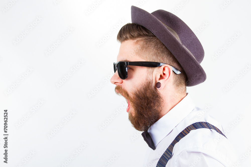 hipster with hat making funny faces Stock Photo | Adobe Stock