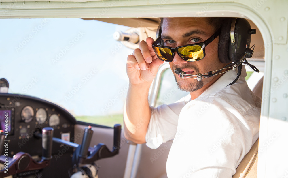 sexy pilot in the plane Stock Photo | Adobe Stock