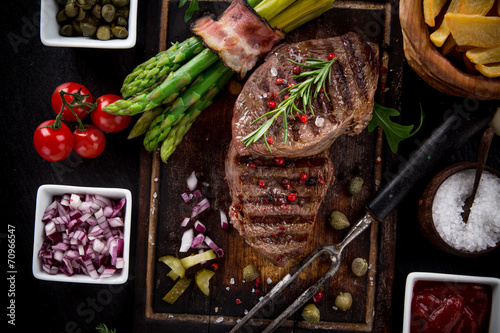 Beef steak on wooden table