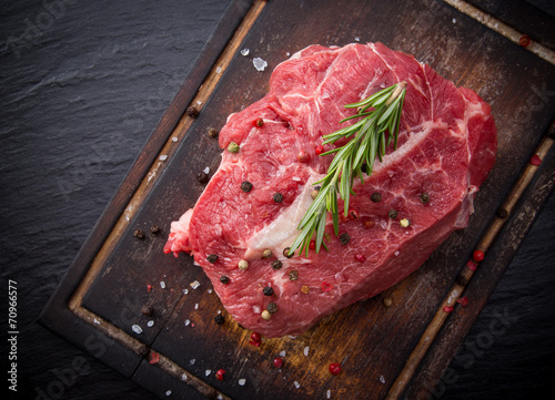 Beef steak on wooden table