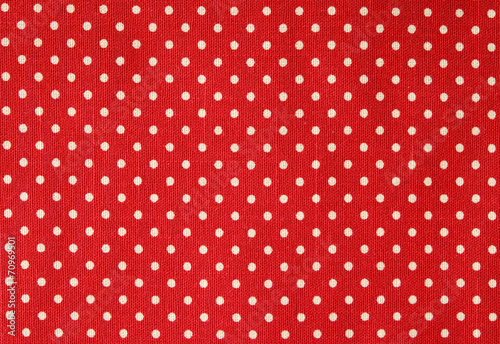 Polka dot on red canvas cotton texture, fabric background