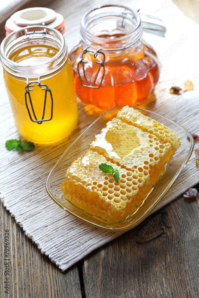 Fresh honey on wooden table Fresh honey on wooden table