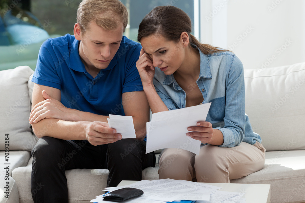 Analyzing family budget at home Analyzing family budget at home