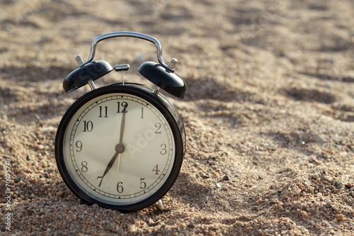 Alarm clock on the beach