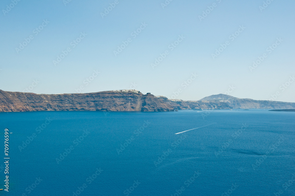 View of Santorini (Thera) in the distance, Greece.