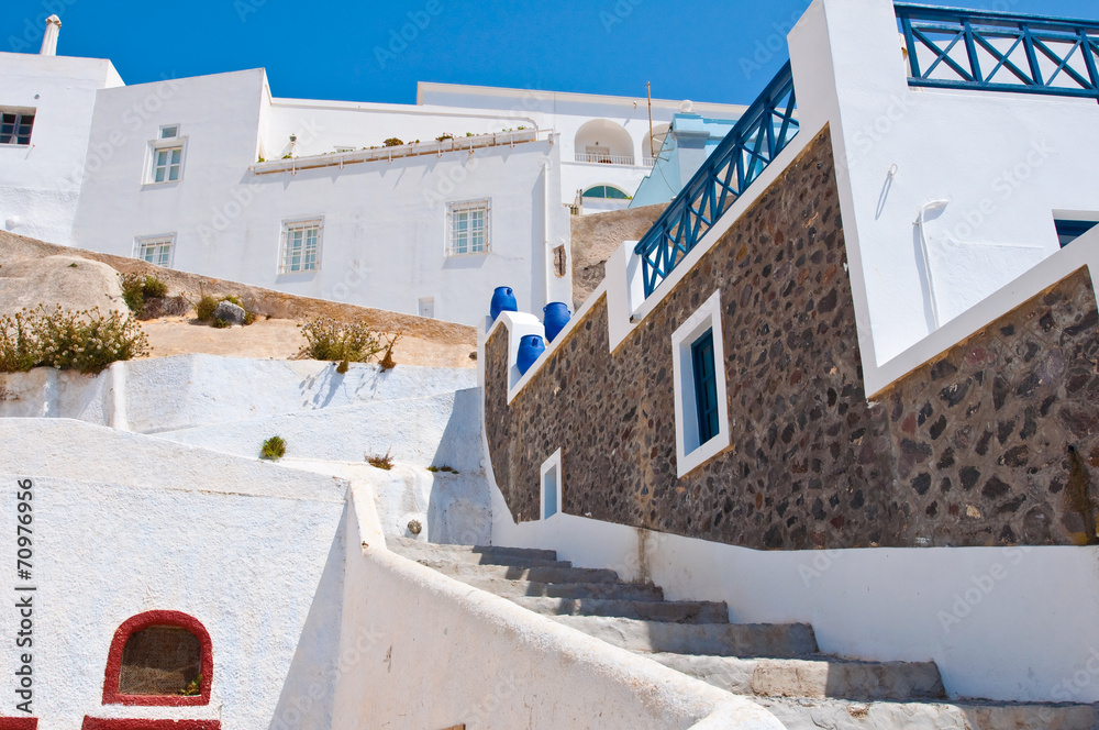 Fira street on the island of Thira (Santorini), Greece.