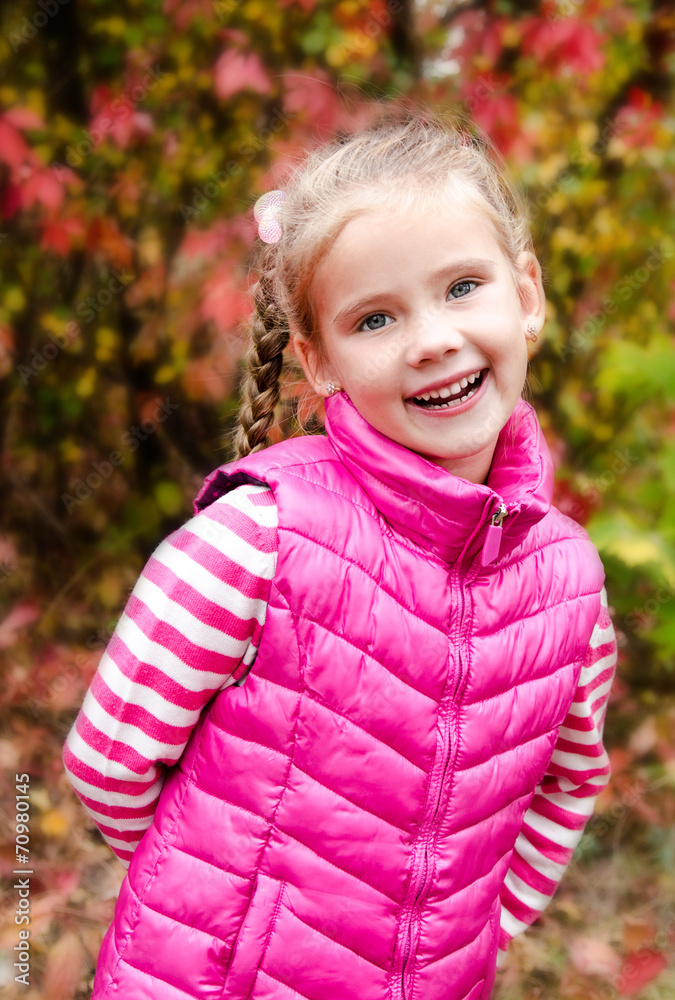 Autumn portrait of cute smiling little girl Autumn portrait of cute smiling little girl