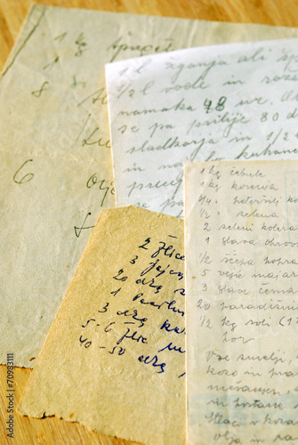 Handwritten recipes on old grunge yellowed paper