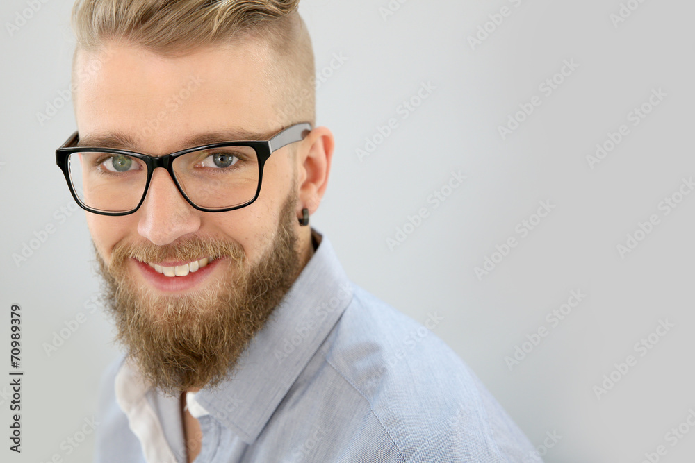 Portrait of trendy guy looking at camera, isolated Portrait of trendy guy looking at camera, isolated