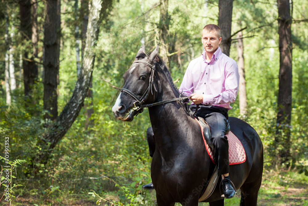 handsome man on horse